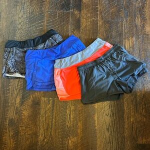 4 pair of women size small Athleta running shorts. Great used condition.